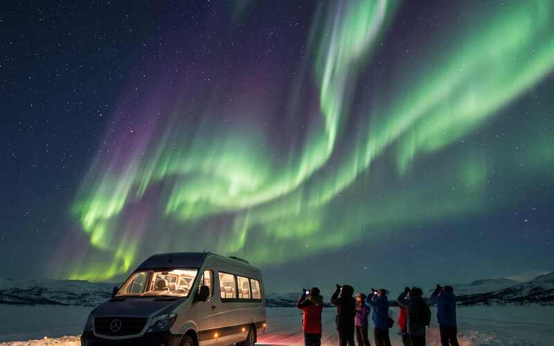 Aurora Borealis safari by snowmobile