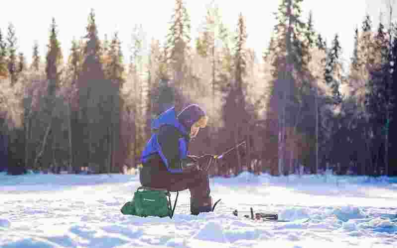 Fishing experience by snowmobile