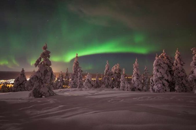 Northern Lights in an old Lappish cottage